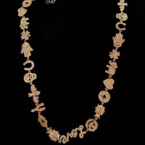 Gold necklace with charms